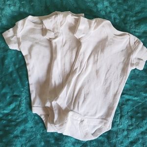 NB white onesies